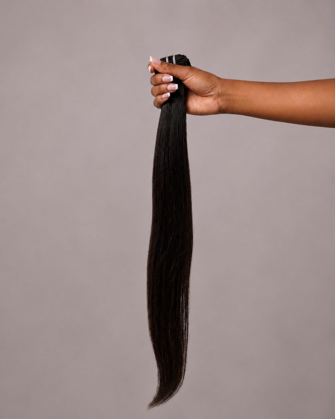 Vietnamese raw hair bundles held in hand